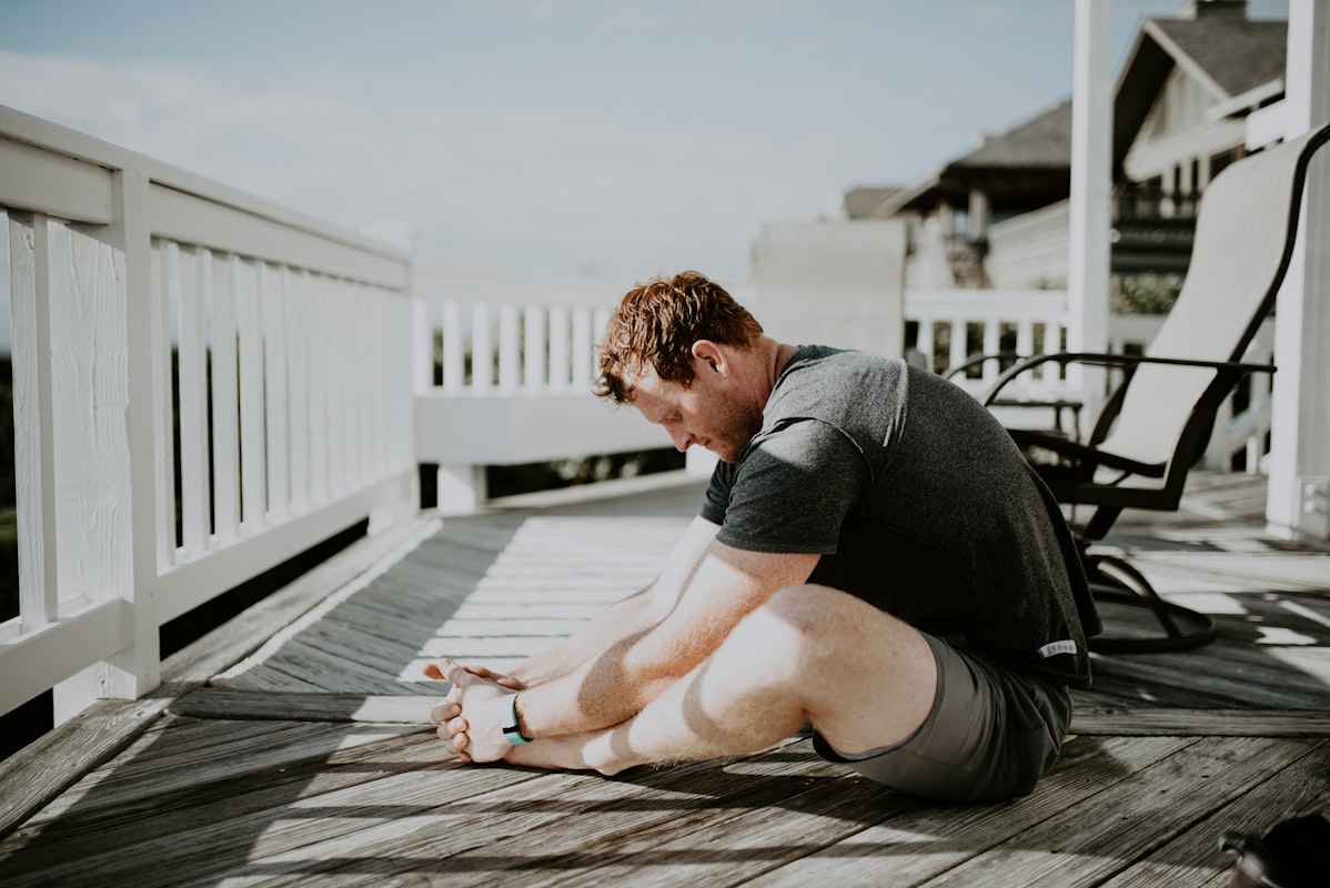 Athlete stretching after exercise to support joint flexibility
